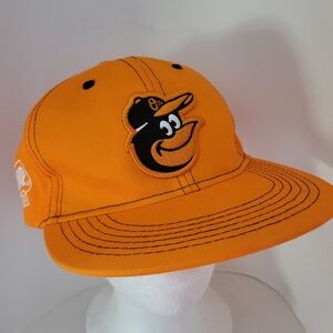 The DAP Cap Dad Against Predators Snap Back Orange Contrast Stitching ORIOLES
